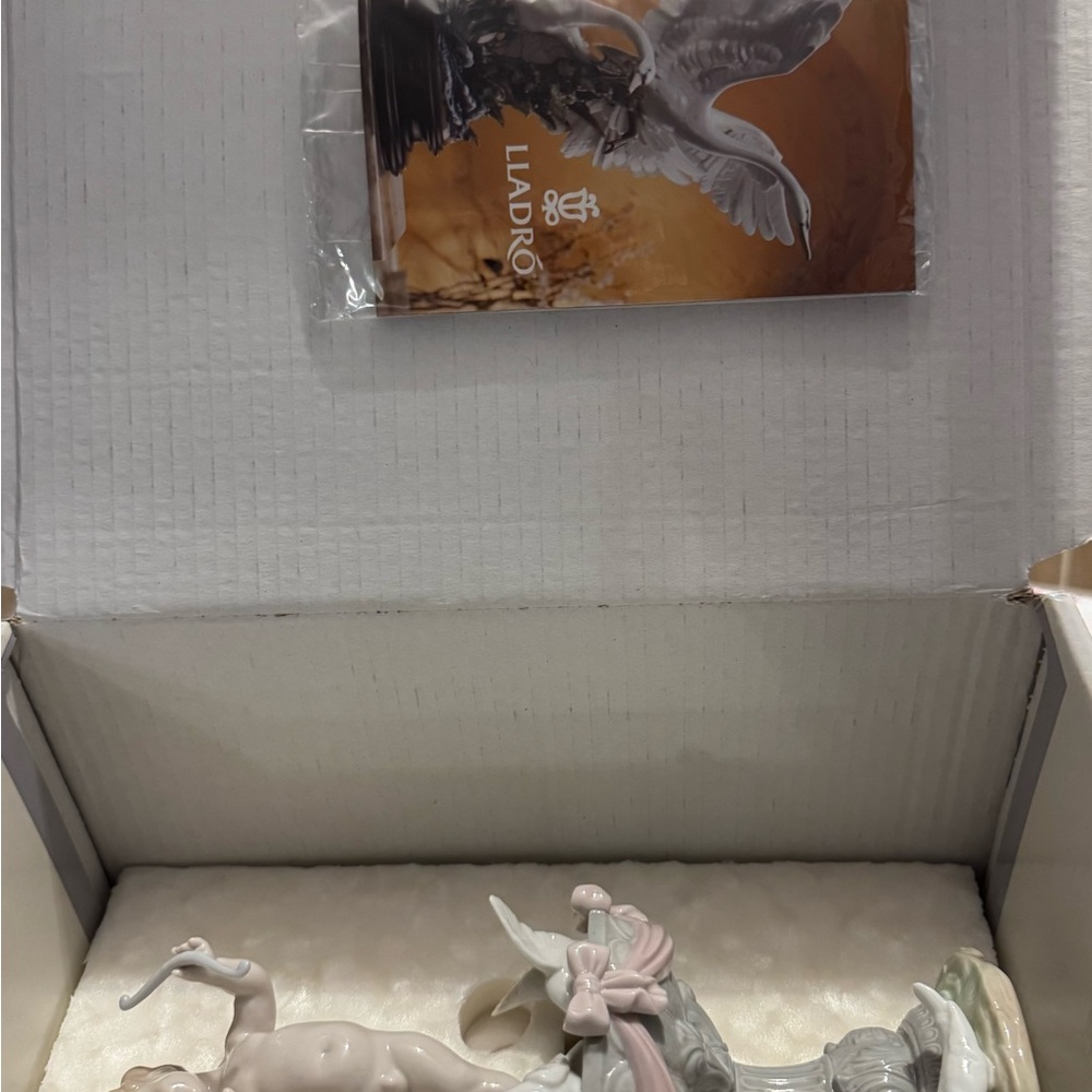 Lladro Porcelain Figurine with Soft Pink and White Accents